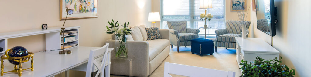 Bright, elegantly furnished living suite at a luxury San Francisco assisted living community.
