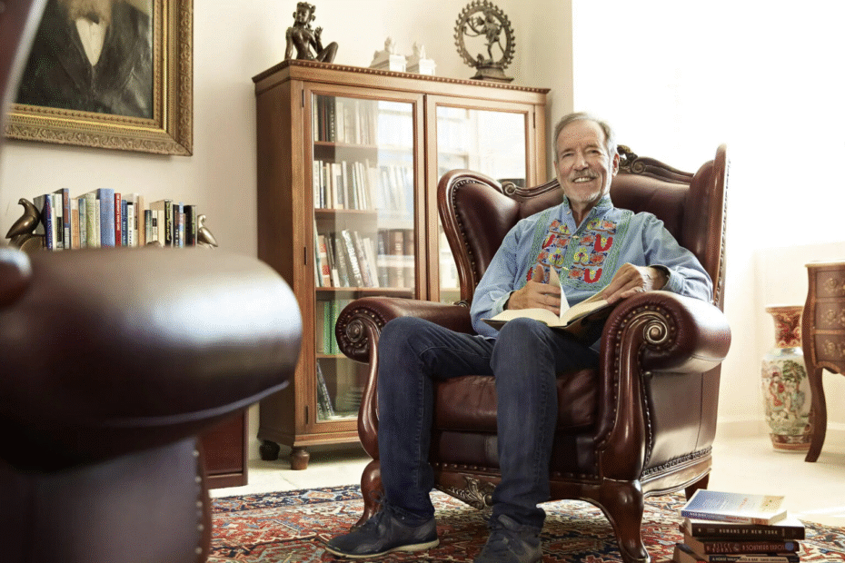 Resident relaxing with a book in a quiet lounge at Rhoda Goldman Plaza.